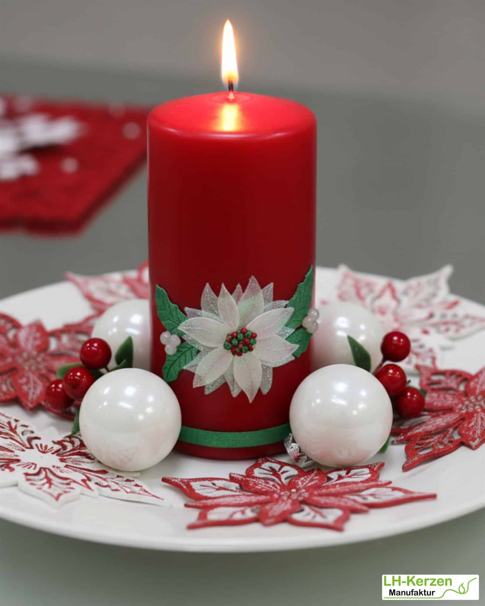 Weihnachtskerzen - weiß mit rotem Weihnachtsstern oder rot mit rosa-weißem Weihnachsstern